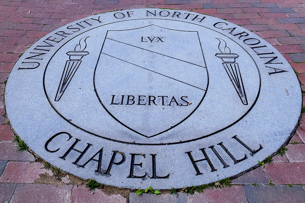 an image of the UNC emblem behind South Building
