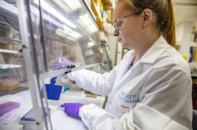 Research technician Katherine Sholtis completes HIV assays
