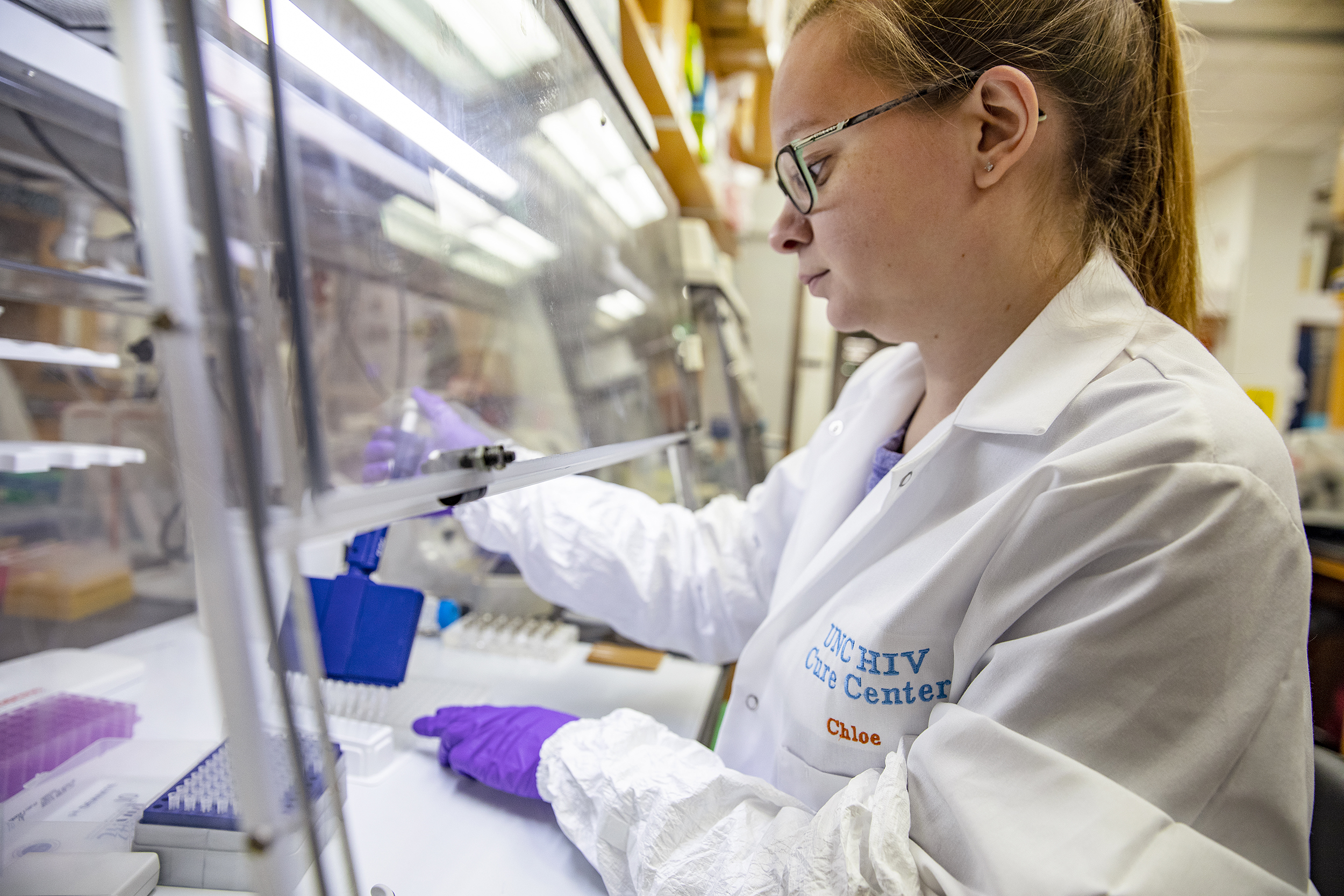 Research technician Katherine Sholtis completes HIV assays