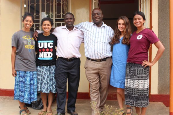 Flores (left) with her collegues in Uganda
