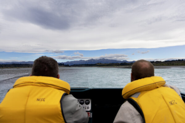 Steve Terry and Lyndon Slater guide a jetboat along the Waimakariri River