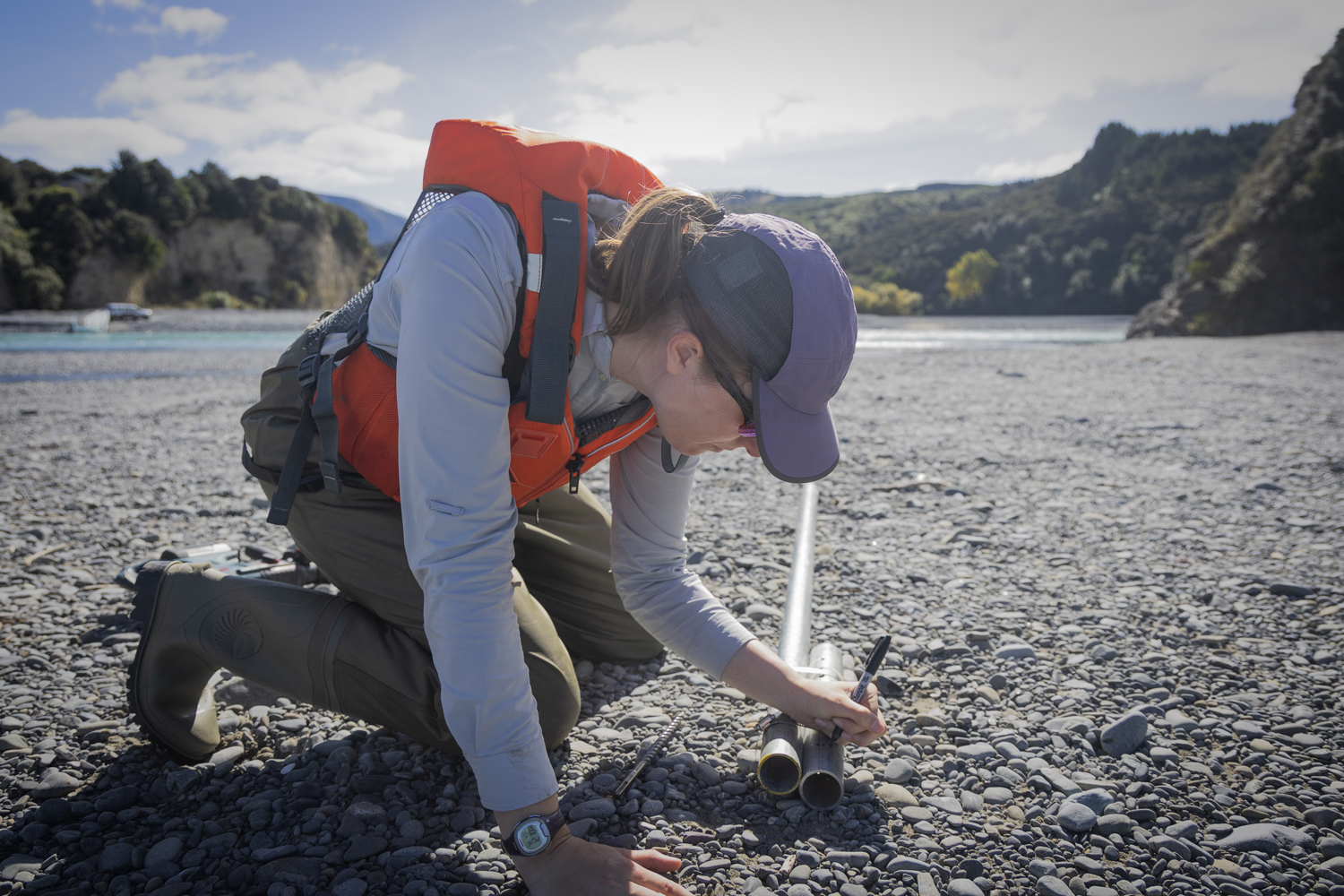 Camryn Kluetmeir readies a water-level logger 