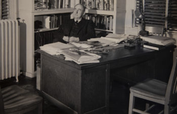 Howard Odum sits in his office in the UNC Alumni Building