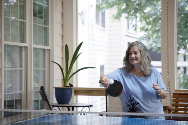 Jen Youngstrom hits a ping-pong ball