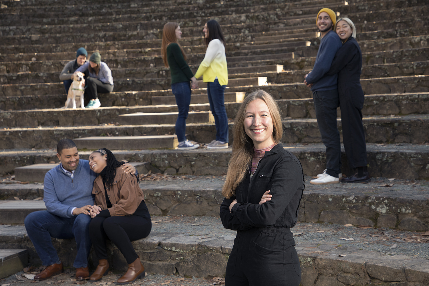 Tatum Jolink at the Forest Theater with four couples posing behind her