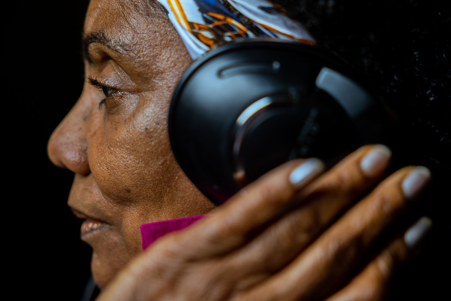 Charlene Regester wearing headphones