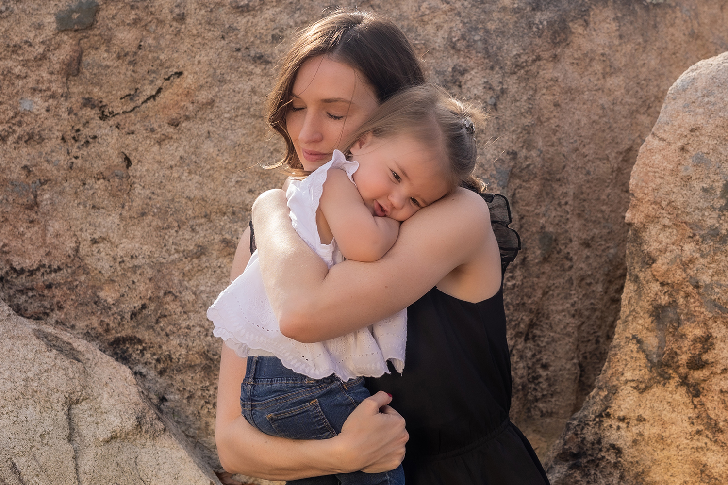 Jessica Griffiths hugs her 18-month-old daughter, Genevieve