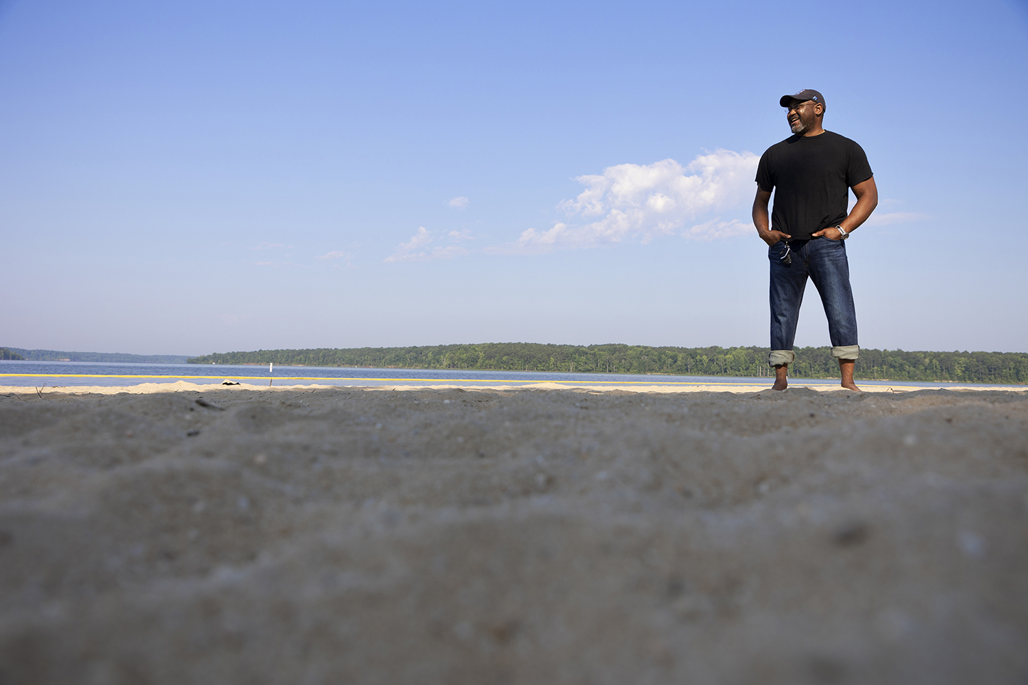 Brent Harrison stands on the beach