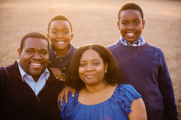 Kimberly Burnett, her husband Otis, and her two sons Braxton and Bryce