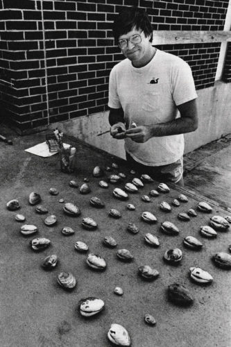Peterson paints clams for later identification in the laboratory