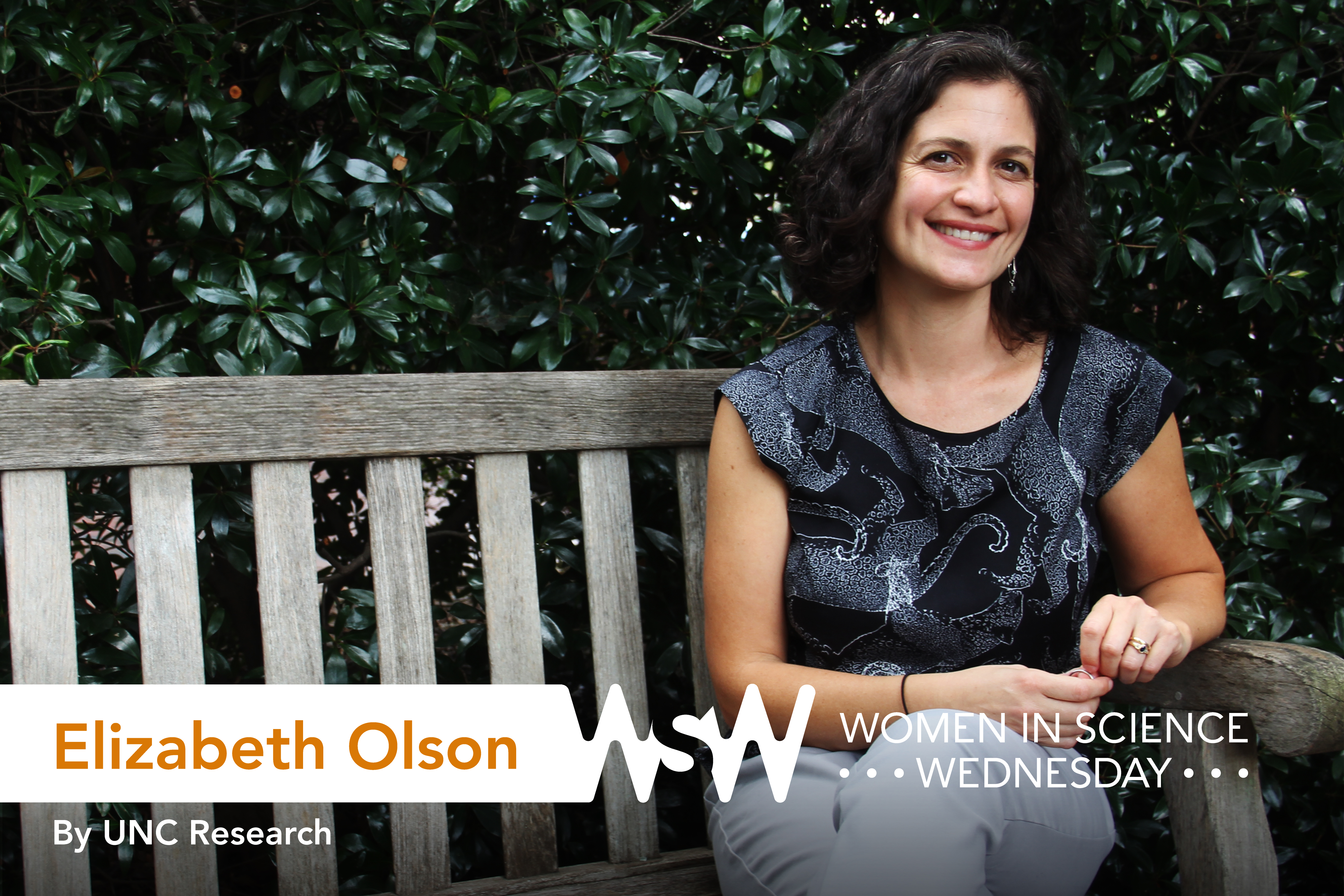 Elizabeth Olson poses on a bench on campus.