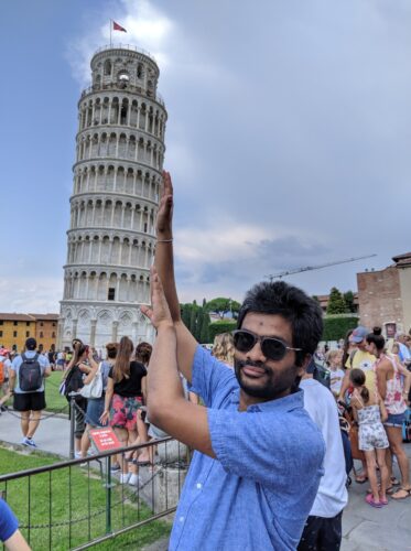 Mohit Bansal in front of the Leaning Tower of Pisa in Italy