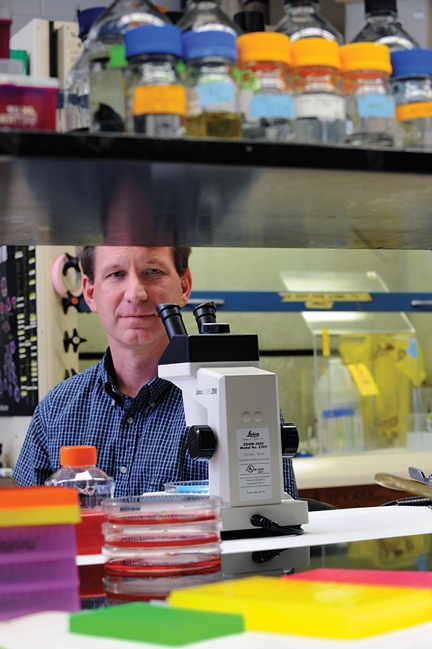 Portrait of Ned Sharpless in the lab.