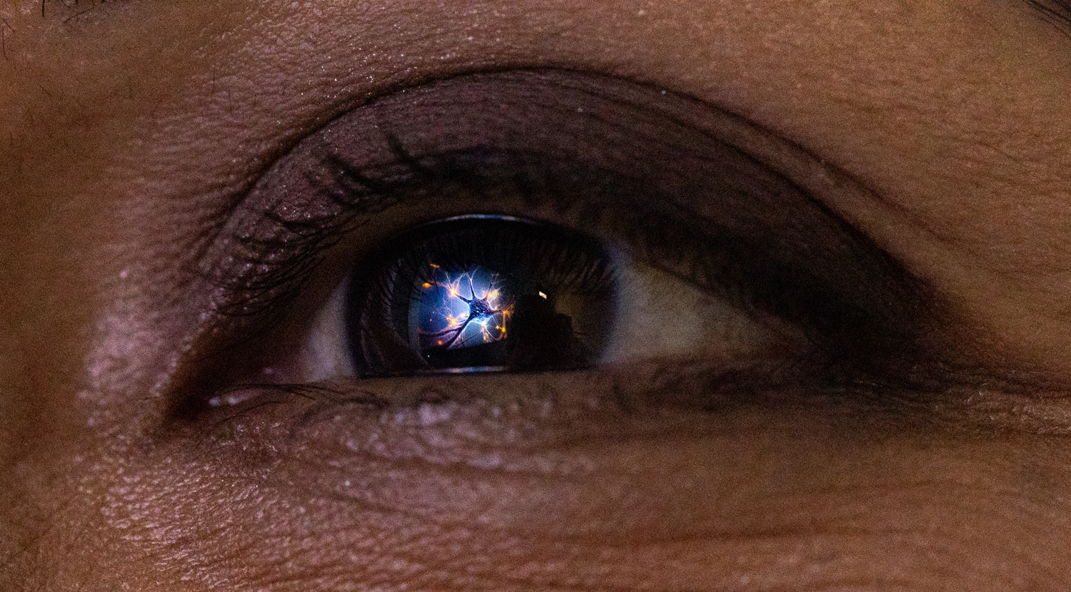 a neuron reflected in Tanya Garcia's eye