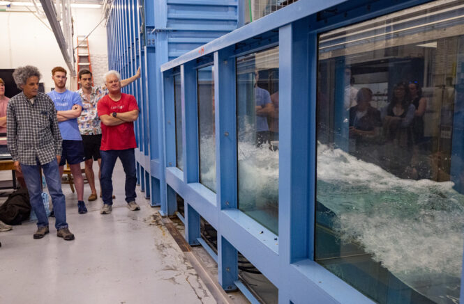 Roberto Camassa (left) and Rich McLaughlin (right) give a tour of the UNC Fluids Lab