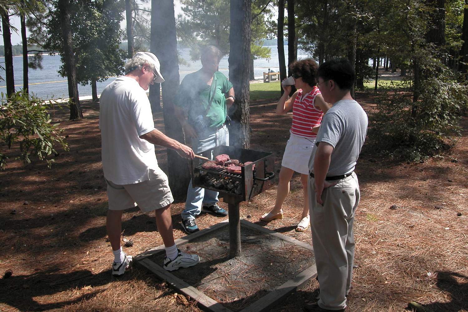 Ken Jacobson grills at his annual lab picnic