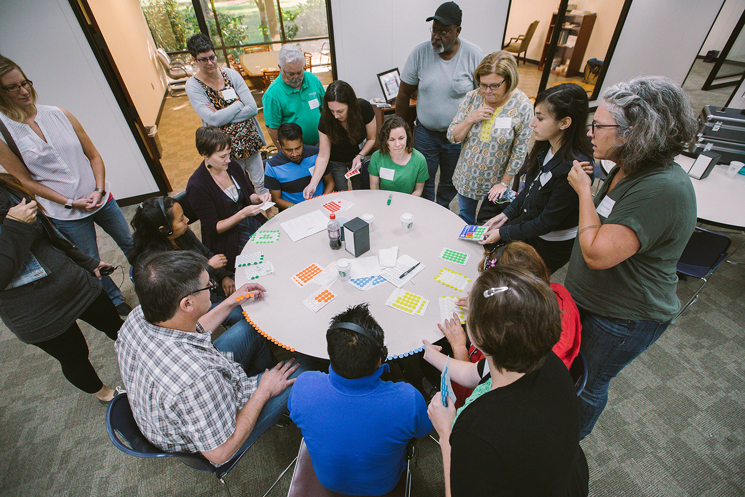 Carolina Textile District members gather around a table