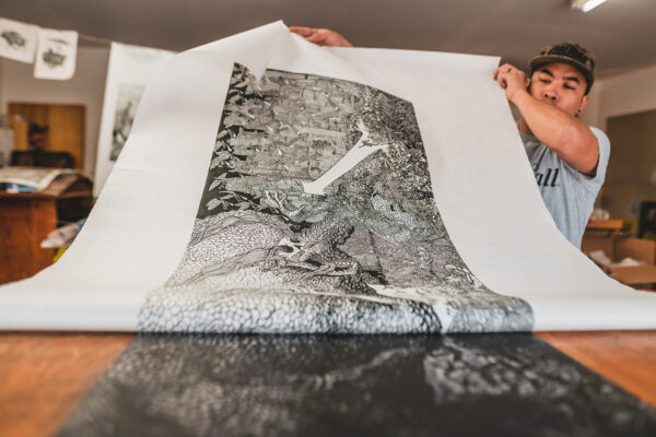 Raj Bunnag peels a print of a printing block