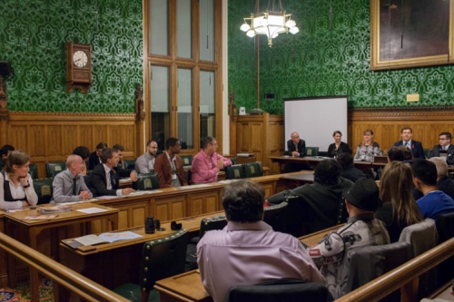 Photo of multiple spears at the British Parliament in November to talk about their findings on trans people in electoral politics.